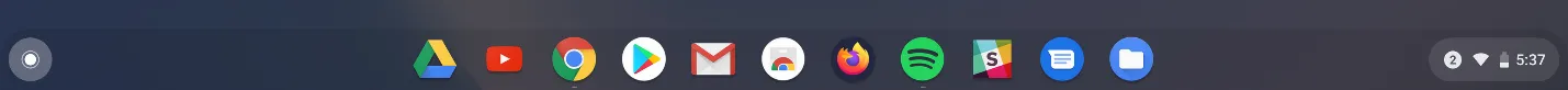 Taskbar Chrome OS di bagian tengah