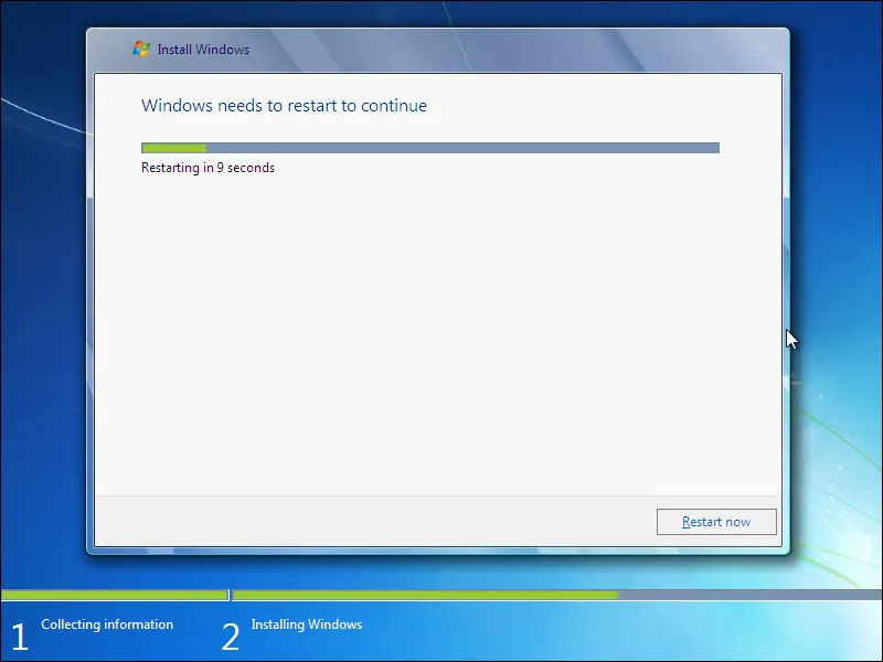 9. Proses restart setelah instalasi Windows 7 di hard drive